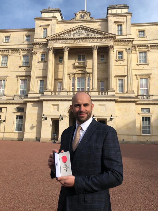 Kyle collects his MBE